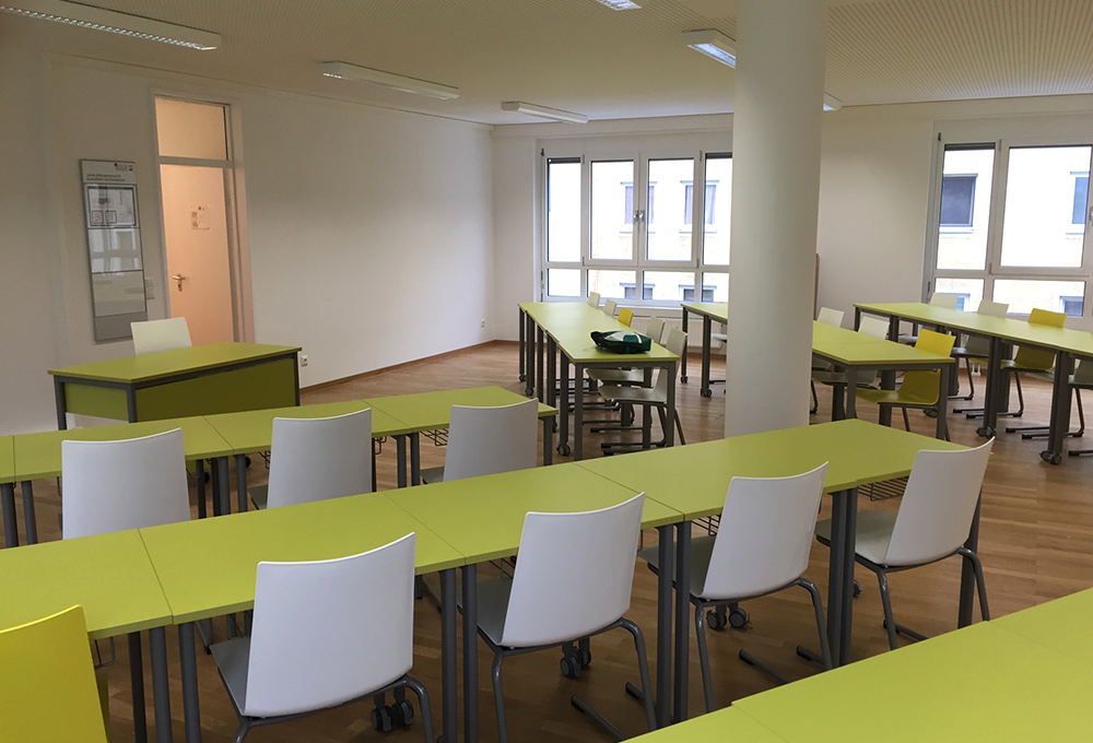 Ein Raum mit Stühlen und Tisch | © Caritas München und Oberbayern.
